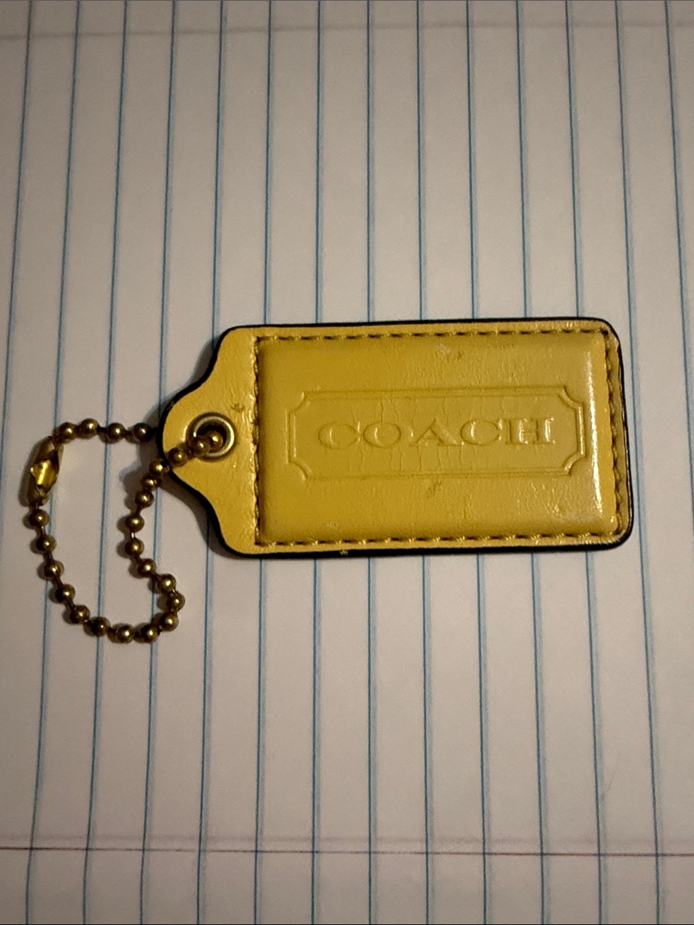 Coach pastel pale yellow leather hangtag preloved